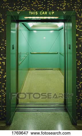 An elevator going up View Large Photo Image Stock Photo - An elevator going up. Fotosearch