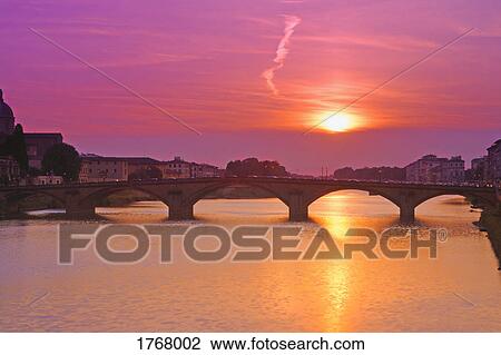 Stock Image - Arno River at Sunset Florence Tuscany Italy. Fotosearch