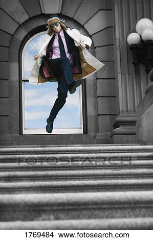 Picture - Businessman leaps. Fotosearch