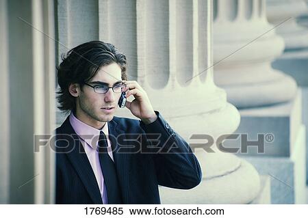 Businessman on cell phone View Large Photo Image Stock Photography - Businessman on cell phone. Fotosearch