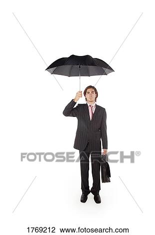 Stock Image - Businessman sheltered from the storm. Fotosearch