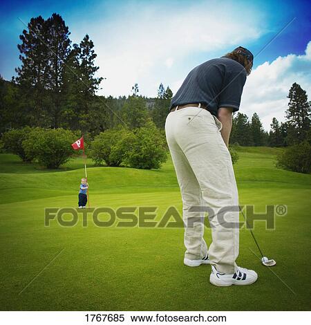 Child holds flag for adult View Large Photo Image Stock Photography - Child holds flag for adult. Fotosearch