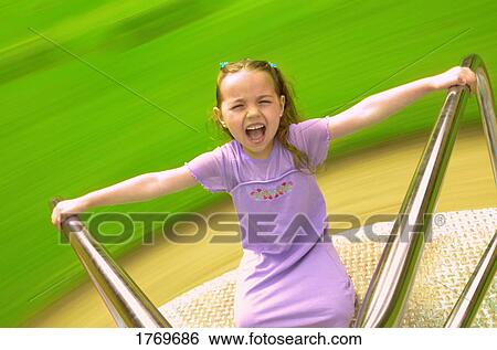 Child on merry-go-round View Large Photo Image Stock Photograph - Child on merry-go-round. Fotosearch