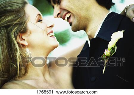 Stock Image - Closeup of happy couple. Fotosearch
