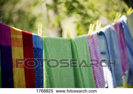 Stock Photography - Clothes hanging up on the line. Fotosearch