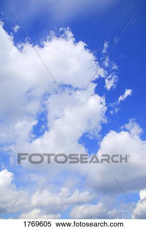 Stock Photography - Clouds in a blue sky. Fotosearch