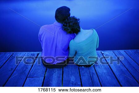 Couple enjoy a quiet evening View Large Photo Image Stock Photography - Couple enjoy a quiet evening. Fotosearch