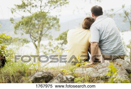Stock Photography - Couple enjoy the view. Fotosearch