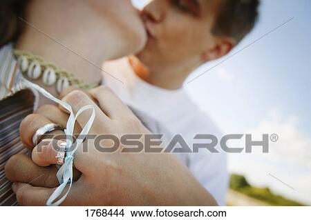 Couple kissing View Large Photo Image Picture - Couple kissing. Fotosearch