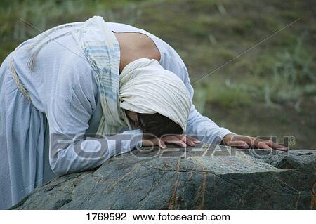 Crying and praying View Large Photo Image Stock Image - Crying and praying. Fotosearch