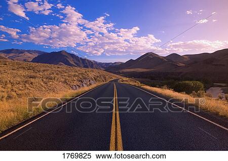 Stock Photography - Empty road in the daytime. Fotosearch