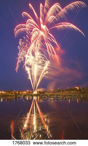 Stock Image - Fireworks display On Canada Day Sherwood Park Alberta Canada. Fotosearch