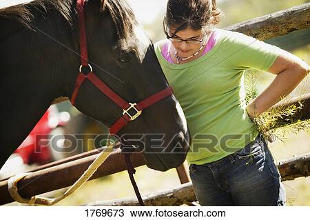 Girl with horse View Large Photo Image Stock Image - Girl with horse. Fotosearch