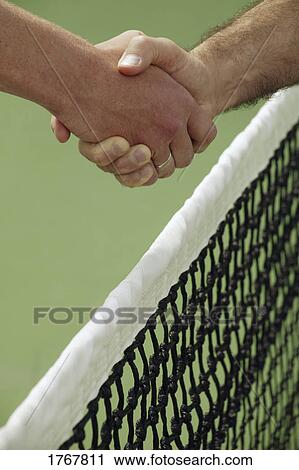 Handshake before a tennis game View Large Photo Image Stock Image - Handshake before a tennis game. Fotosearch