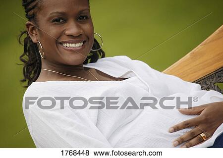 Happy pregnant woman View Large Photo Image Stock Photo - Happy pregnant woman. Fotosearch