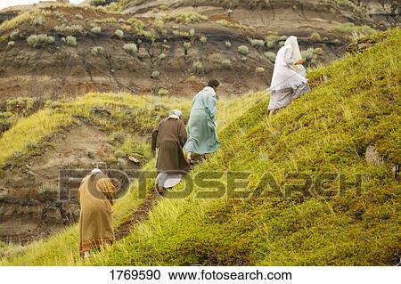Jesus leads three disciples up a hill View Large Photo Image Stock Image - Jesus leads three disciples up a hill. Fotosearch
