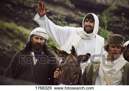 Stock Photo - Jesus rides on a colt. Fotosearch