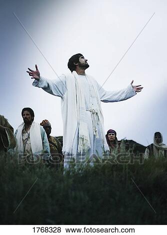 Stock Photo - Lights shines on Jesus. Fotosearch
