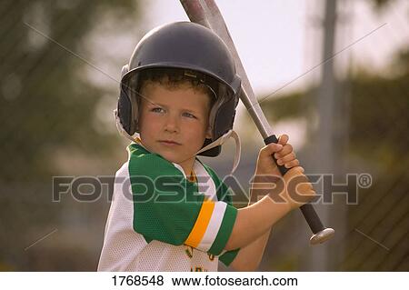 Stock Photo - Little boy playing baseball. Fotosearch