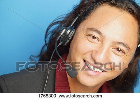 Stock Image - Man with a headset. Fotosearch