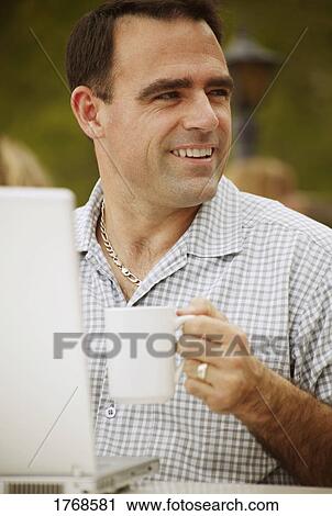 Stock Image - Man with coffee. Fotosearch
