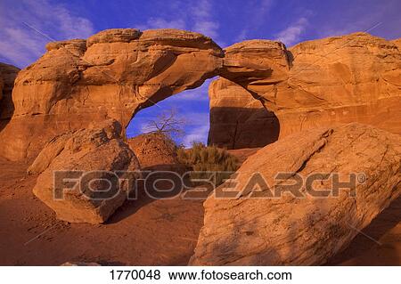Natural sandstone archway View Large Photo Image Stock Photo - Natural sandstone archway. Fotosearch