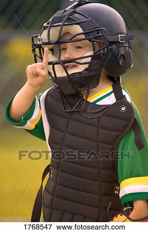 Portrait of boy's Little League baseball catcher View Large Photo Image Stock Photo - Portrait of boy's Little League baseball catcher. Fotosearch