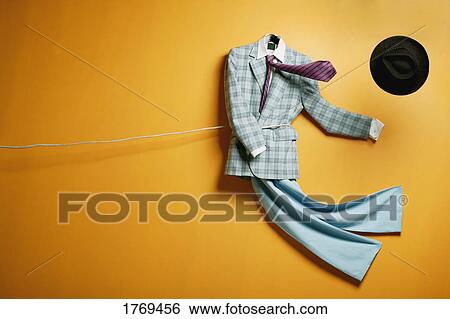 Stock Photograph - Pulling in a business suit. Fotosearch