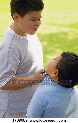 Stock Photo - Sibling rivalry. Fotosearch