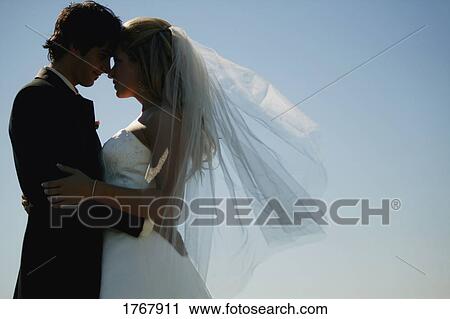 Silhouette of a bride and groom View Large Photo Image Stock Image - Silhouette of a bride and groom. Fotosearch