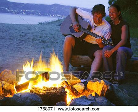 Songs by campfire View Large Photo Image Stock Image - Songs by campfire. Fotosearch
