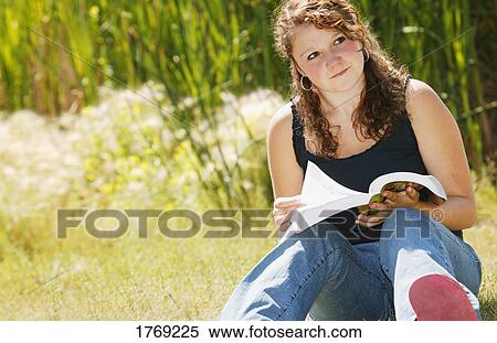 Stock Photography - Student reading. Fotosearch