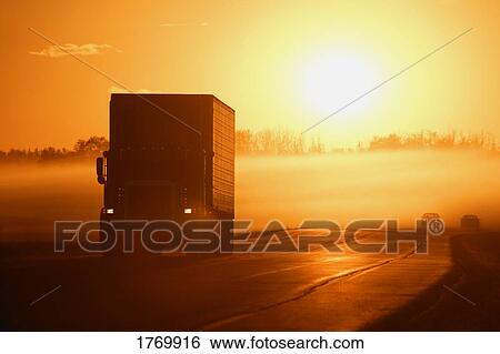 Sunrise on the highway View Large Photo Image Stock Photograph - Sunrise on the highway. Fotosearch