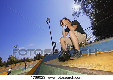 Stock Image - Teen feels disappointed. Fotosearch