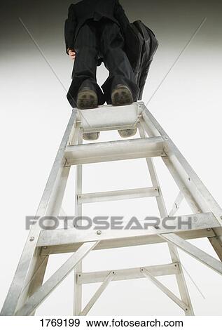 The top of the corporate ladder View Large Photo Image Stock Photo - The top of the corporate ladder. Fotosearch