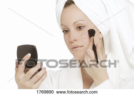 Woman applying blush View Large Photo Image Stock Image - Woman applying blush. Fotosearch