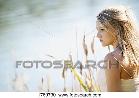 Woman enjoys summer afternoon View Large Photo Image Stock Image - Woman enjoys summer afternoon. Fotosearch