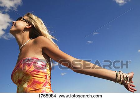 Woman enjoys the outdoors View Large Photo Image Picture - Woman enjoys the outdoors. Fotosearch