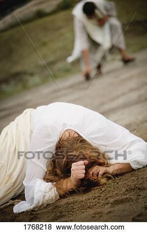 Stock Photo - Woman is caught in the act. Fotosearch