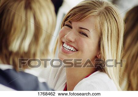 Young woman laughing View Large Photo Image Stock Image - Young woman laughing. Fotosearch