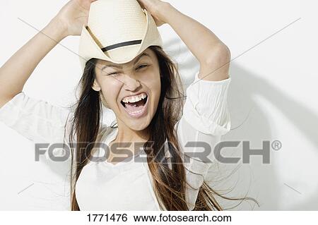 A cowgirl having a good time View Large Photo Image Stock Photograph - A cowgirl having a good time. Fotosearch
