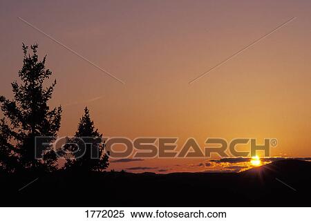 Stock Photography - Beautiful calm sunset. Fotosearch