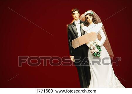 Bride and groom ornament with Band-Aid on them View Large Photo Image Stock Image - Bride and groom ornament with Band-Aid on them. Fotosearch