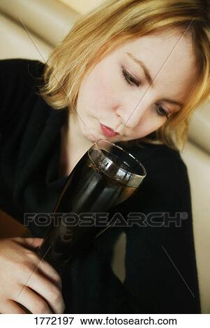 Businesswoman sitting with coffee View Large Photo Image Stock Photo - Businesswoman sitting with coffee. Fotosearch