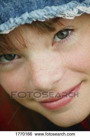 Closeup of a girl's face View Large Photo Image Stock Photograph - Closeup of a girl's face. Fotosearch
