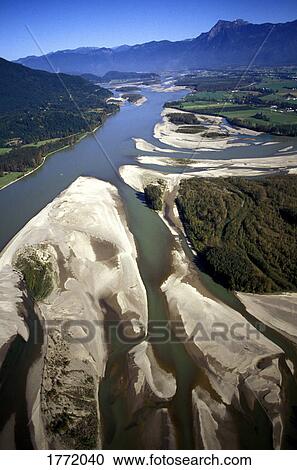 Stock Image - Countryside and river. Fotosearch