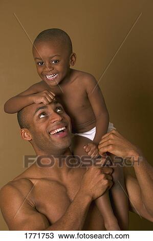 Dad and son together View Large Photo Image Stock Image - Dad and son together. Fotosearch
