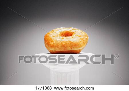 Stock Photo - Doughnut on a pillar. Fotosearch