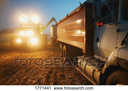 Farm machinery harvesting crop View Large Photo Image Stock Image - Farm machinery harvesting crop. Fotosearch