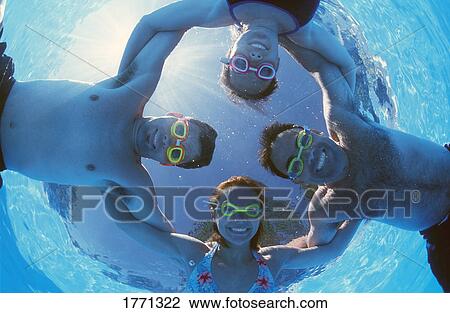 Four adults in swimming pool View Large Photo Image Stock Image - Four adults in swimming pool. Fotosearch